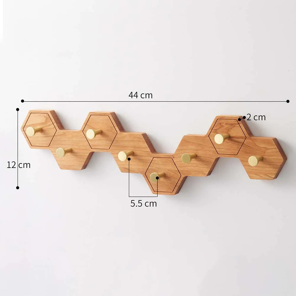 Eight-hook honeycomb wooden wall rack measuring 44 cm long, 12 cm high and 2 cm deep