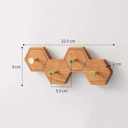Eight-hook honeycomb wooden wall rack measuring 22.5 cm long, 9 cm high and 2 cm deep
